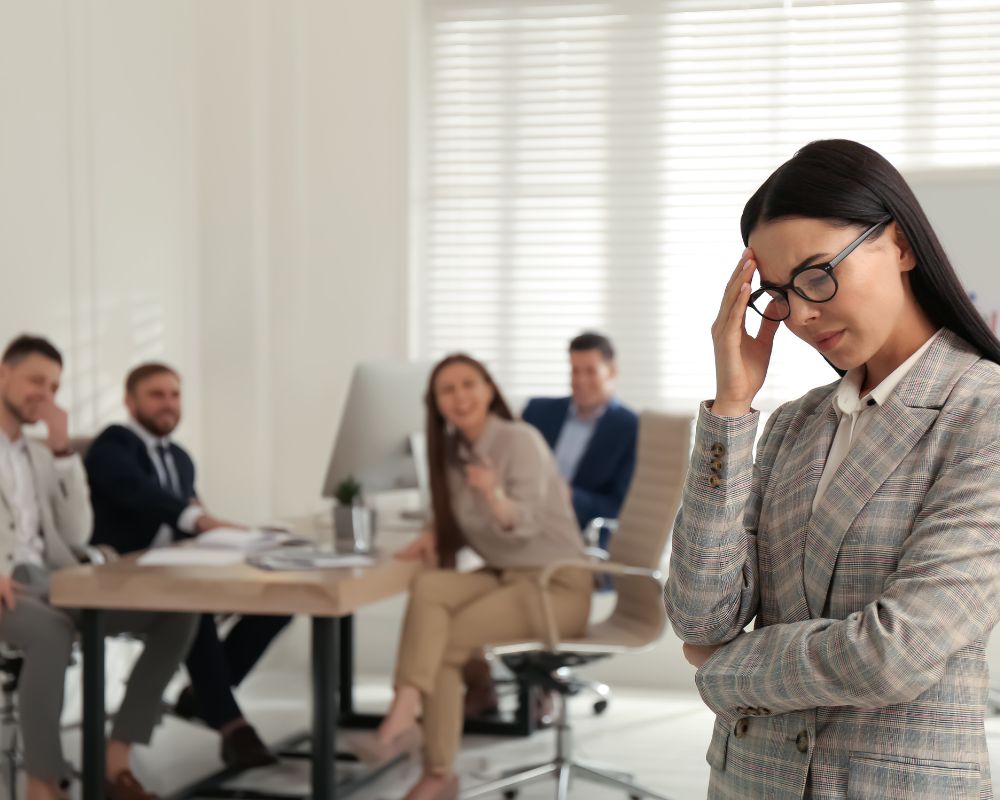 woman experiencing professional triangulation