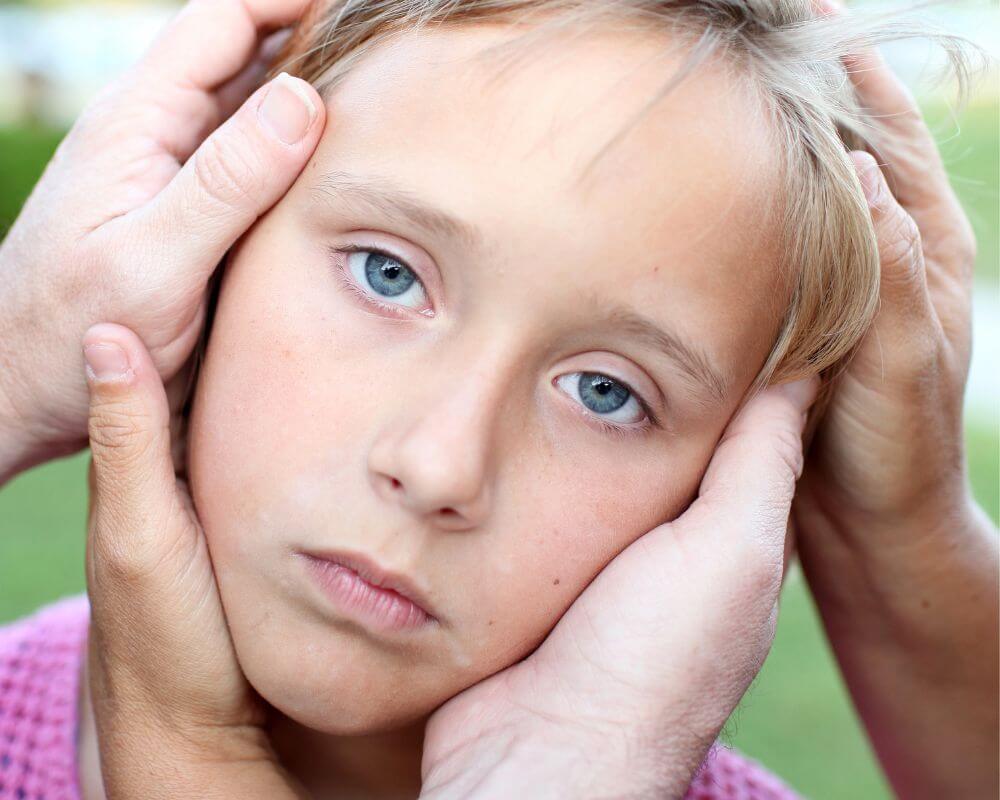 a frustrated child being controlled by parents