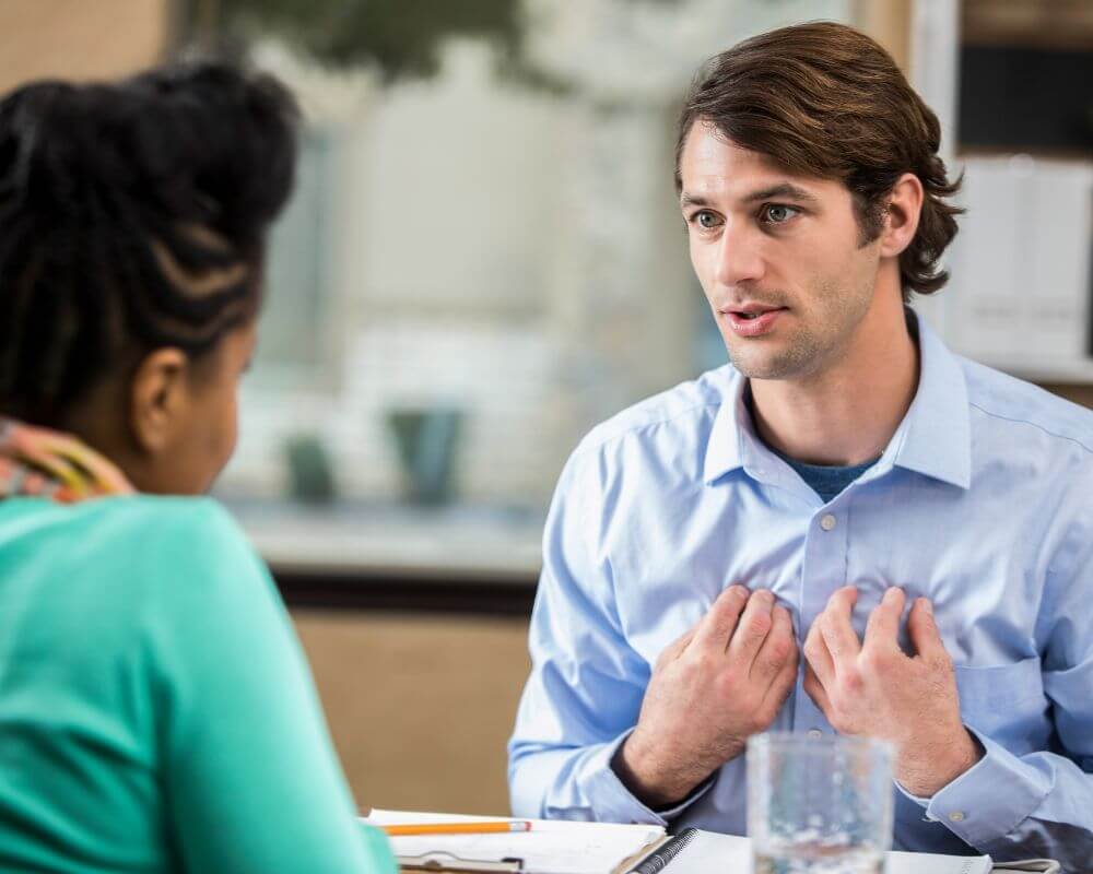 guy openly talking to a woman with comfort