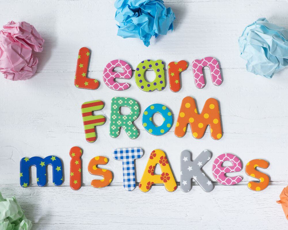 a banner stating "Learn From Mistakes"