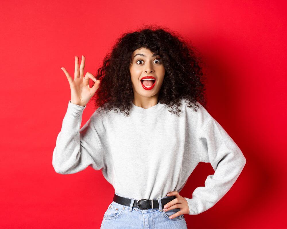 woman giving a gesture of compliments