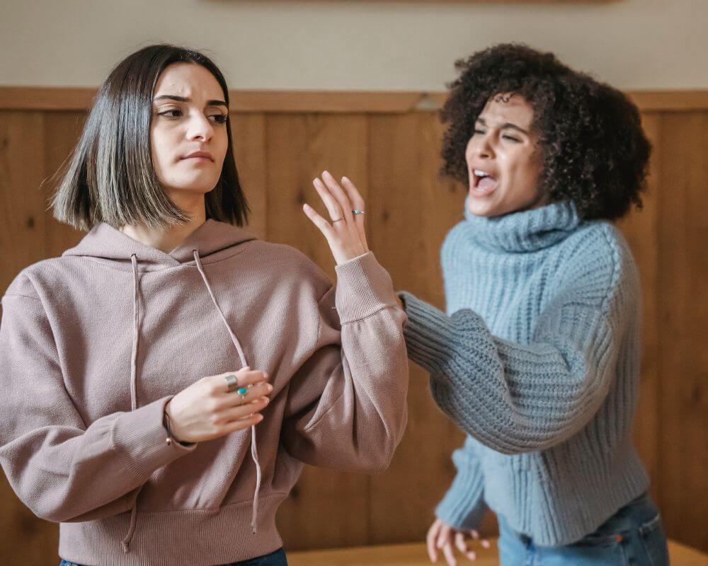 woman not paying attention to rude person