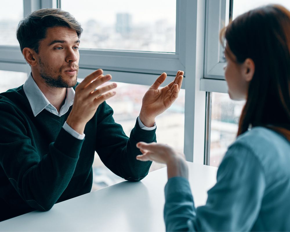 woman and man talking to each other